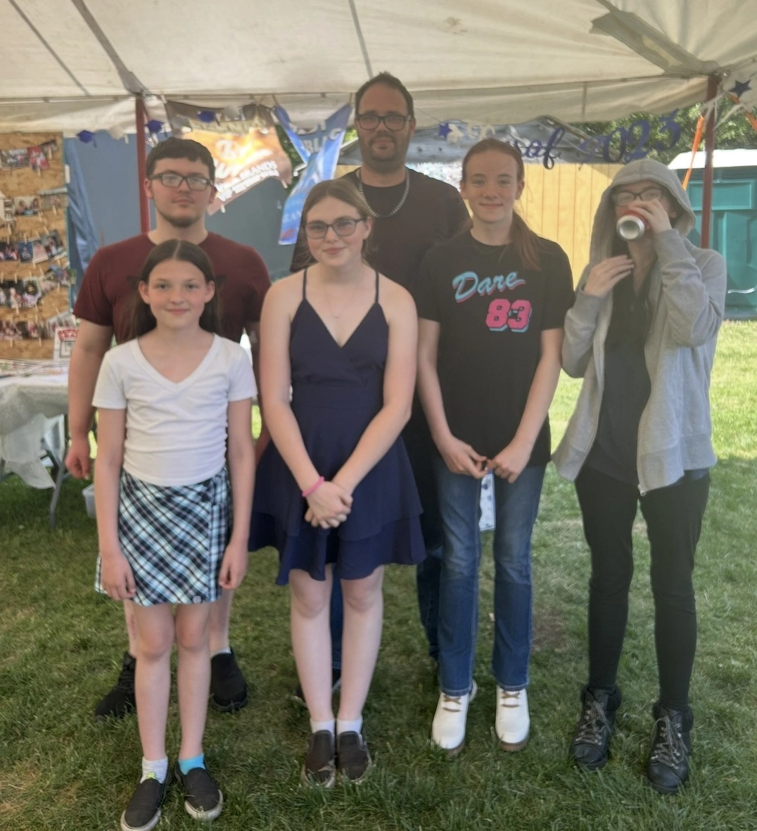 Taylor with friends at a fair